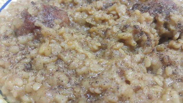 A close up  view of Cooked white rice called Kichra served with meatball in traditional Charsadda recipe popular for its delicious taste in Pakistan