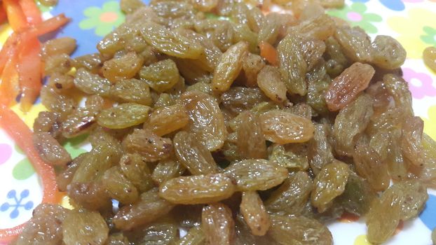 Closeup view of dried or dehydrated fresh green raisins