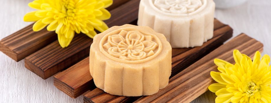 Colorful beautiful moon cake, mung bean cake, Champion Scholar Pastry cake for Mid-Autumn festival traditional gourmet dessert snack, close up.