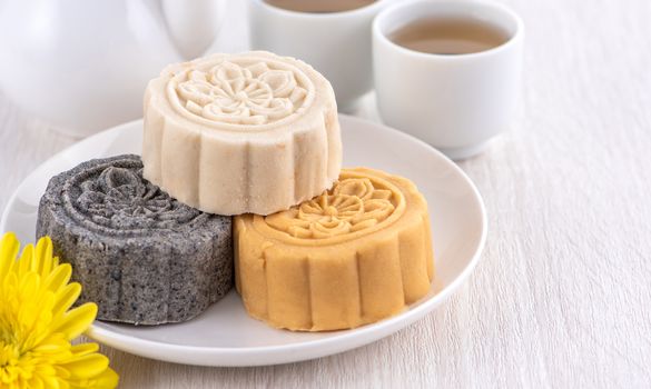 Colorful beautiful moon cake, mung bean cake, Champion Scholar Pastry cake for Mid-Autumn festival traditional gourmet dessert snack, close up.