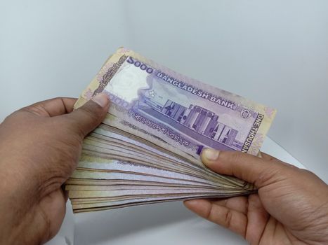 bangladeshi bank note on white background
