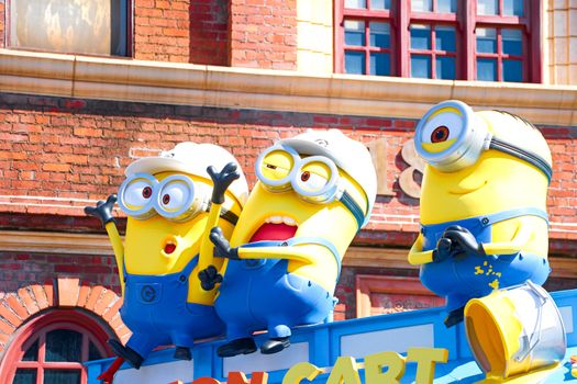 OSAKA, JAPAN - Nov 13, 2019 : Close up HAPPY MINION statue in Universal Studios Japan. Minions are famous character from Despicable Me animation.