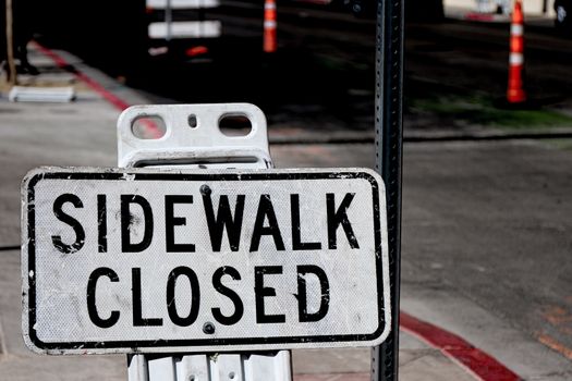 Sidewalk closed sign board.closing a sidewalk