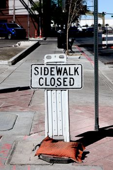 Sidewalk closed sign board.closing a sidewalk