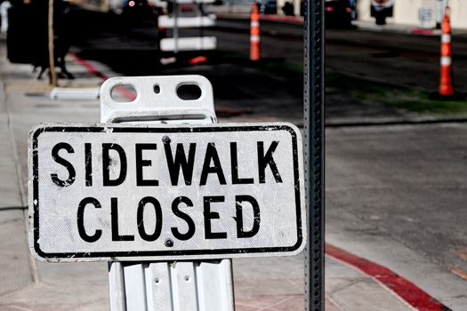 Sidewalk closed sign board.closing a sidewalk