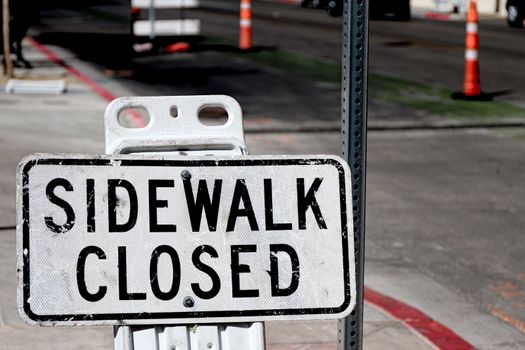 Sidewalk closed sign board.closing a sidewalk