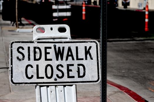 Sidewalk closed sign board.closing a sidewalk