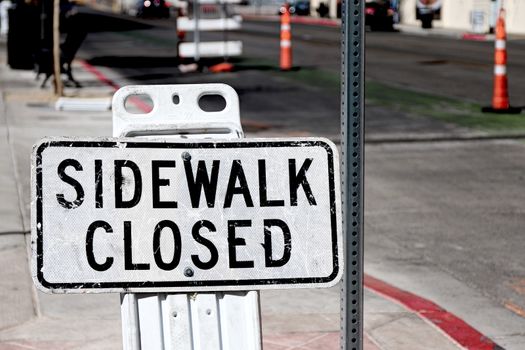 Sidewalk closed sign board.closing a sidewalk