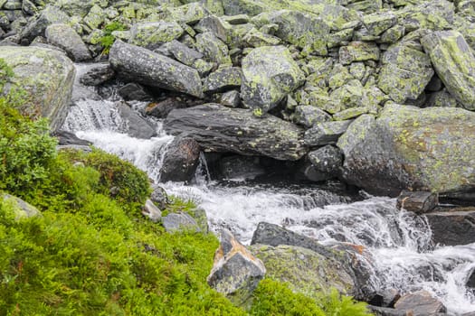 Hydnefossen waterfall and Hydna river on Veslehødn Veslehorn mountain in Hemsedal, Norway.