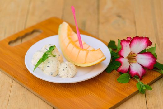 ice cream melon on wood table