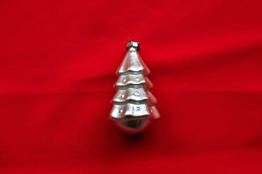 Christmas tree decoration, small silver Christmas tree. The concept of the new year and Christmas.