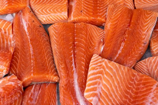 Raw Salmon Fillets on Ice for Sale at Market