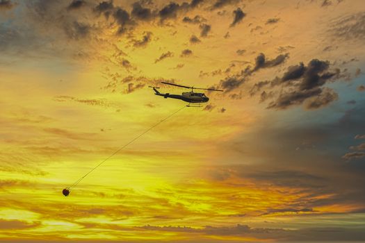 Fire fighting water bombing helicopter in The Blue Mountains in Australia