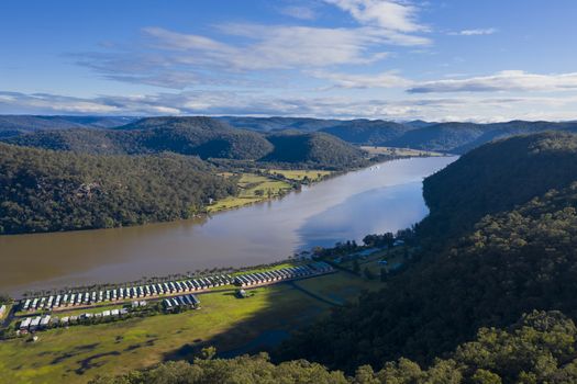 Holiday cabins along the banks of the Hawkesbury River in regional New South Wales in Australia