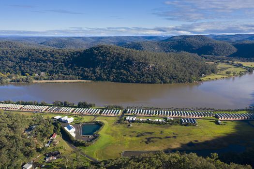 Holiday cabins along the banks of the Hawkesbury River in regional New South Wales in Australia