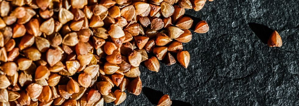 Buckwheat grain closeup, food texture and cook book backgrounds