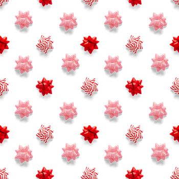 Seamless regular creative Christmas pattern with New Year decorations on white background. xmas Modern Seamless pattern made from christmas decorations. Photo quality pattern for fabric, prints, wallpapers, banners or creative design works.