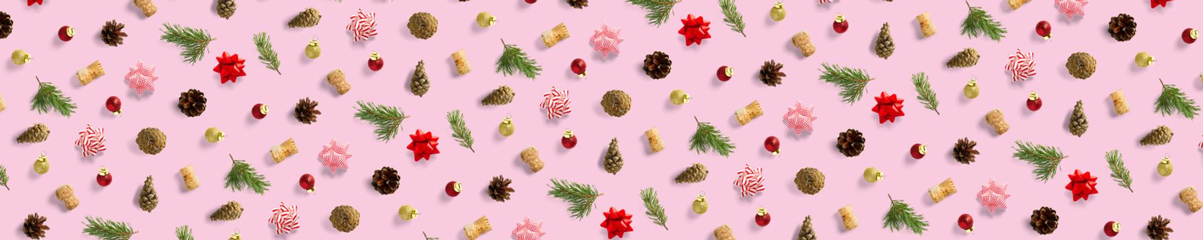 modern christmas background on pink backdrop. creative flat lay for christmas time, banners, posters, prints and other creative works. not seamless pattern