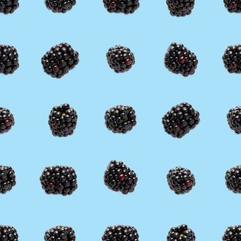 Bramble Seamless pattern. Fresh blackberry seamless pattern. Square pattern with fresh wild berries isolated on blue background. flat lay.