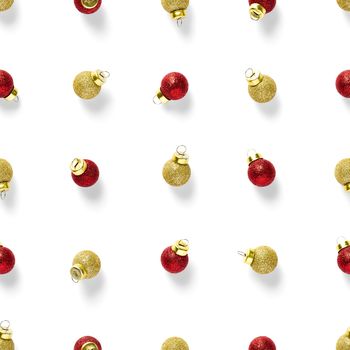 Seamless pattern with red and gold Christmas decorations on white background. Christmas red ornaments Seamless pattern. Christmas abstract background made from balls.