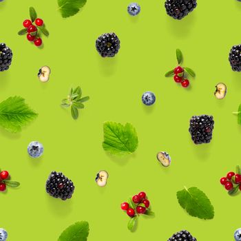 Creative seamless pattern of wild berries, blackberry, blueberry, lingonberry and bramble. modern seamless pattern on green backgriund made from autumn forest wild berries. Forest berries mix