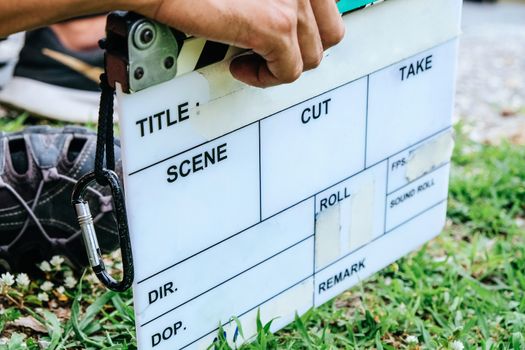 Film Slate, close up image of film production crew holding Film Slate on set