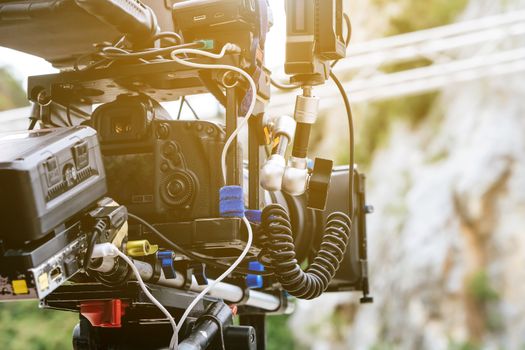 Film industry. Filming with professional camera background