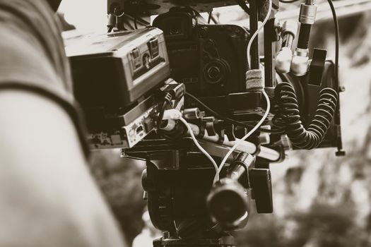 Film industry. Filming with professional camera background