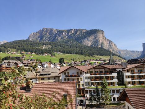 Val Gardena, Italy - 09/15/2020: Scenic alpine place with magical Dolomites mountains in background, amazing clouds and blue sky  in Trentino Alto Adige region, Italy, Europe