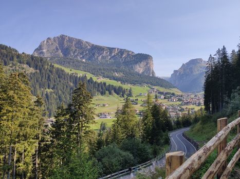 Val Gardena, Italy - 09/15/2020: Scenic alpine place with magical Dolomites mountains in background, amazing clouds and blue sky  in Trentino Alto Adige region, Italy, Europe