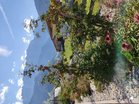 Val Gardena, Italy - 09/15/2020: Scenic alpine place with magical Dolomites mountains in background, amazing clouds and blue sky  in Trentino Alto Adige region, Italy, Europe