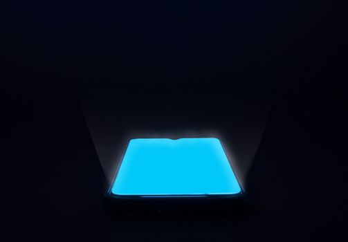 A phone with a blank blue screen on a dark black background.