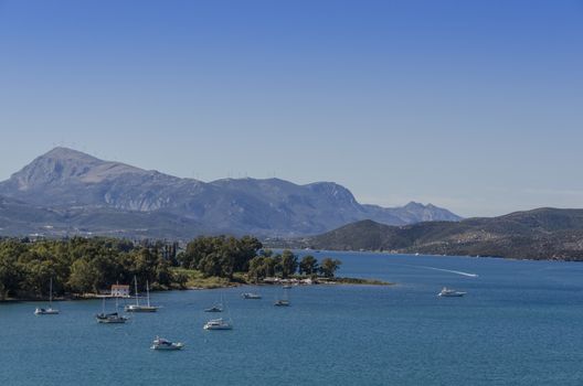 surroundings of the port of pores in the Tyrrhenian Sea where you can see the mountains of the Peloponnese Greece