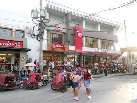 QUEZON CITY, PH - JULY 1 - Jollibee restaurant facade on July 1, 2018 in Quezon City, Philippines.