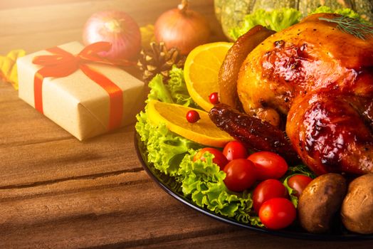 Thanksgiving baked turkey or chicken and vegetables, Christmas dinner feast food decoration, studio shot on wooden table background, Happy thanksgiving day of holiday concept