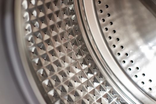 Drum of washing machine dry and clean close-up.Washing Dryer Machine inside view of a drum.
