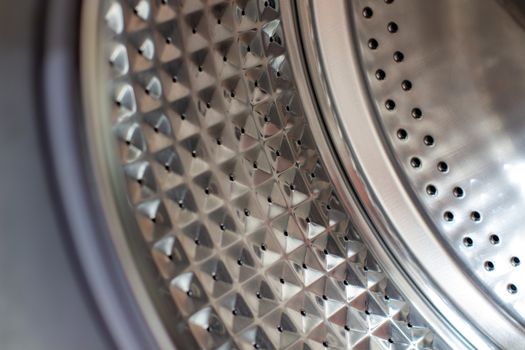 Drum of washing machine dry and clean close-up.Washing Dryer Machine inside view of a drum.