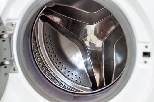 Drum of washing machine dry and clean close-up.Washing Dryer Machine inside view of a drum.