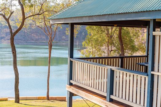 Shaded structure with verandah suitable for the public to relax at a dam popular for recreation