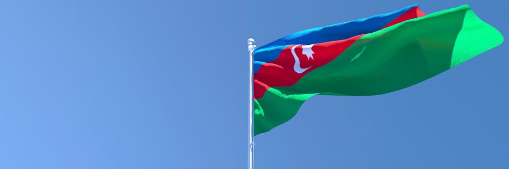 3D rendering of the national flag of Azerbaijan waving in the wind against a blue sky