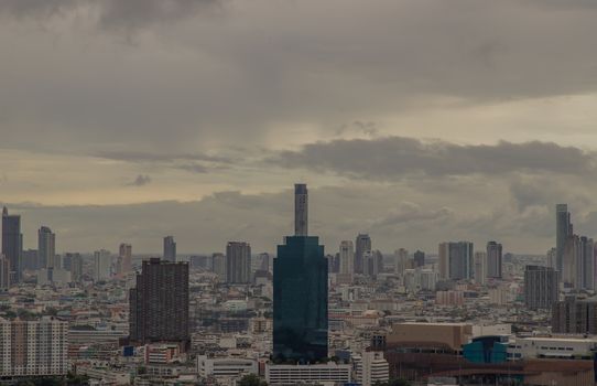 Bangkok downtown cityscape with skyscrapers at evening give the city a modern style. Selective focus.