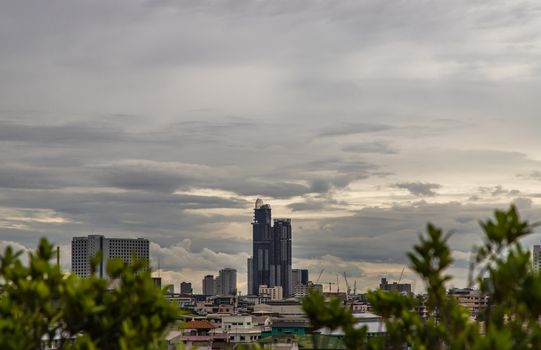 Bangkok downtown cityscape with skyscrapers at evening give the city a modern style. Selective focus.