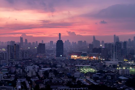 Bangkok downtown cityscape with skyscrapers at evening give the city a modern style. No focus, specifically.