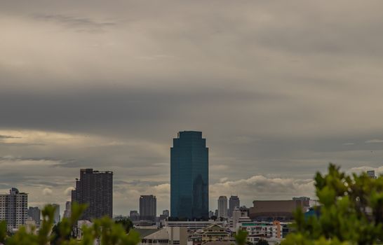 Bangkok downtown cityscape with skyscrapers at evening give the city a modern style. Selective focus.