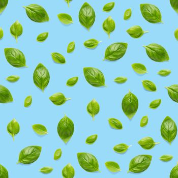 Italian Basil leaf herb seamless pattern on blue background, Creative seamless pattern made from fresh green basil flat lay layout. Food ingredient seamless pattern.