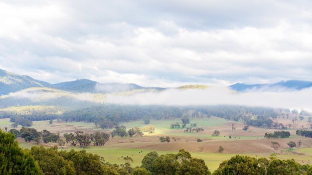 Road Trip - Misty clouds rolling over the Australian country landscape