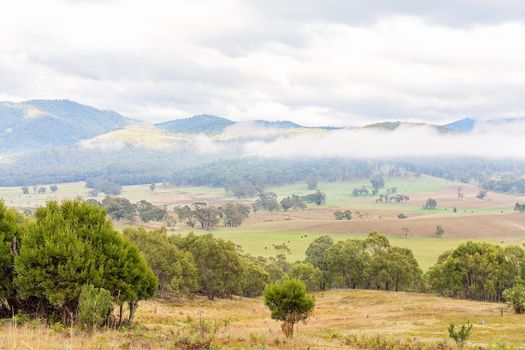 Road Trip - Misty clouds rolling over the Australian country landscape