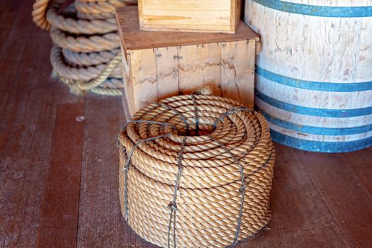 A role of rope, timber boxes and barrel in an old chandler's store at an Australian maritime museum