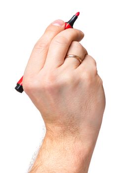 Male hand holding red marker, isolated on white background.