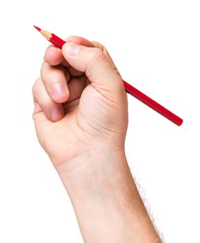 Male hand holding red pencil, isolated on white background.